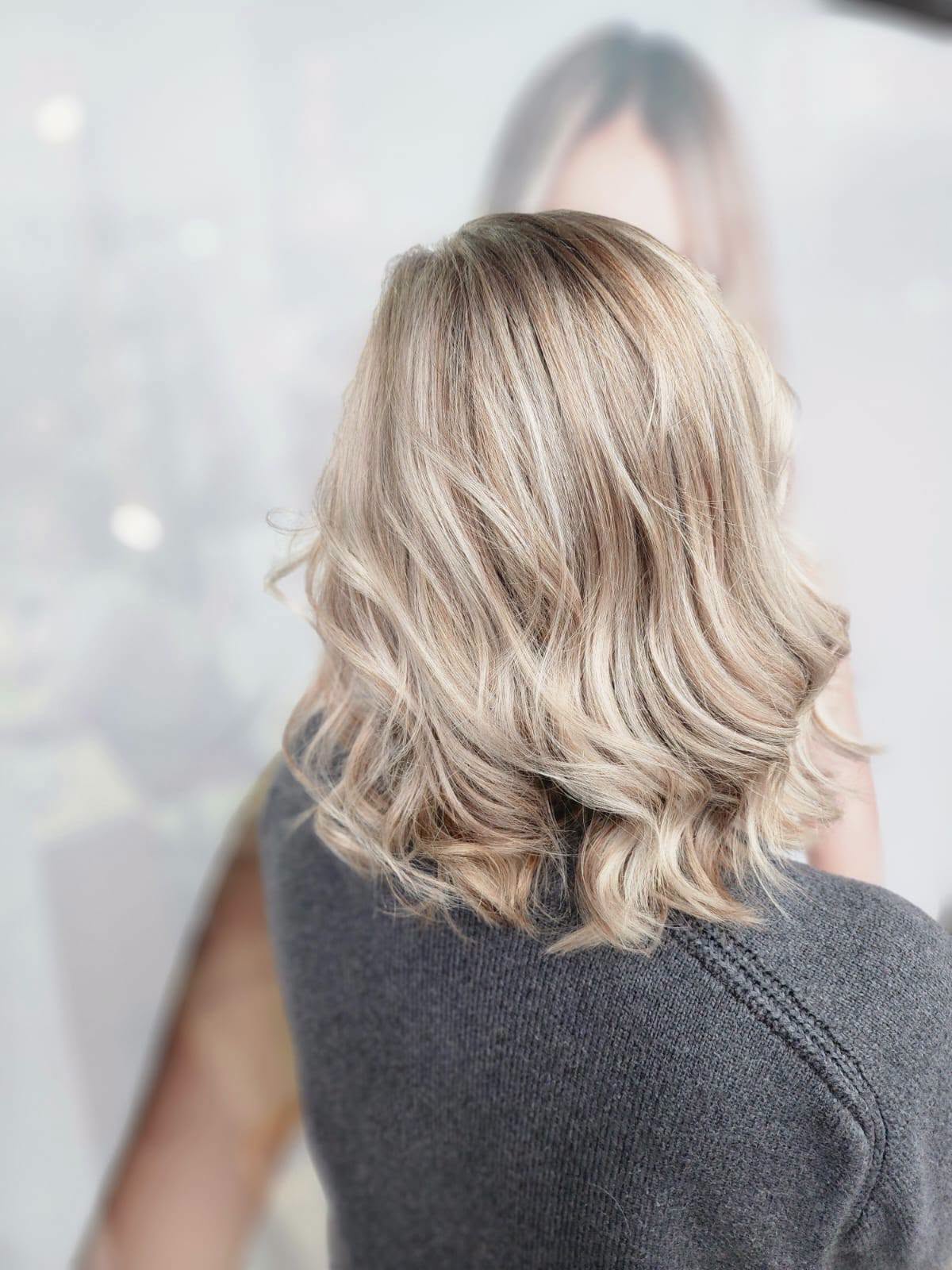 Soft beige-blonde balayage with a wavy lob — Belle Vee, George